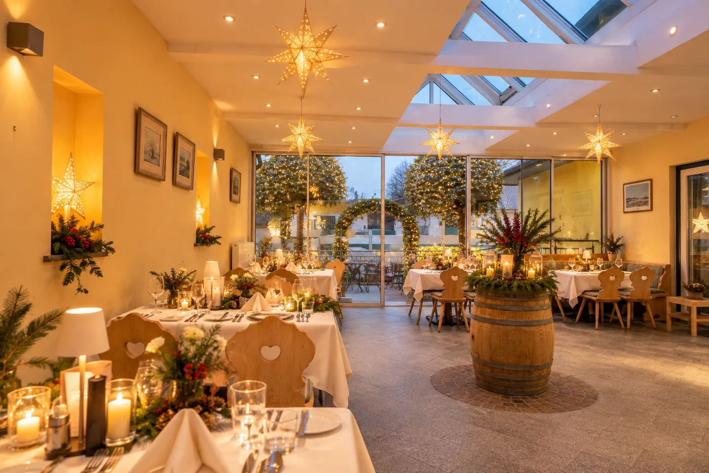 Festively decorated conservatory at Restaurant Schachenwald with tables set for a celebration