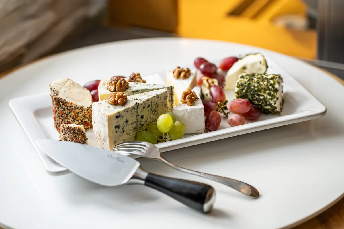 Cheese platter with grapes and walnuts at Restaurant Schachenwald
